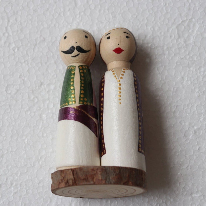 Wood figurines with traditional clothes