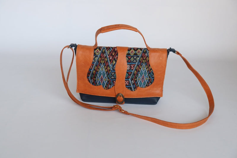 Brown handbag with traditional motifs