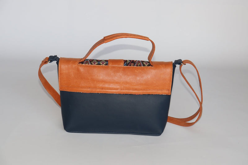 Brown handbag with traditional motifs